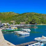 Theophilos Ena *